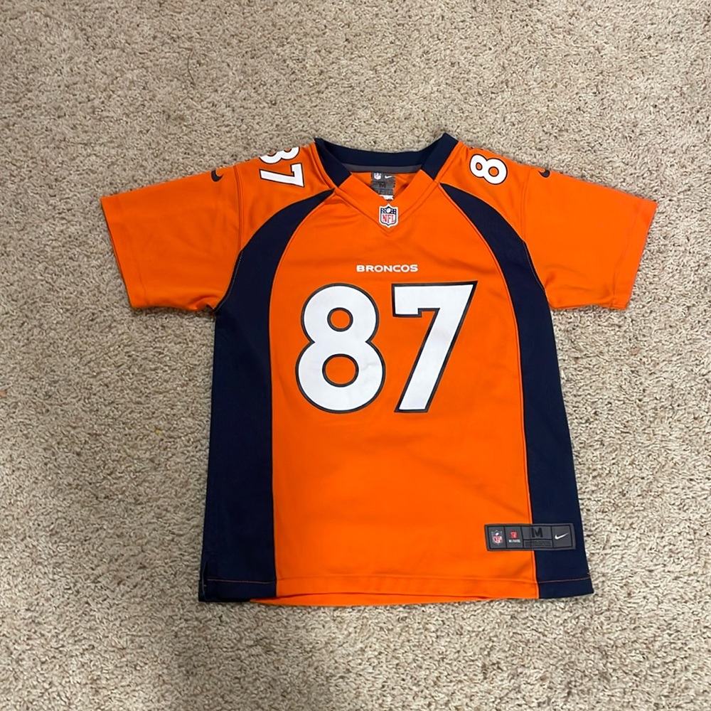 Eric Decker jersey from the Denver Broncos. Unused orange Nike jersey. Medium